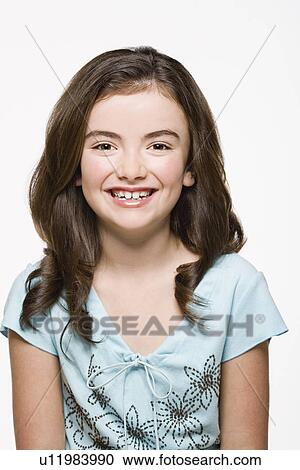 Portrait of smiling girl (8-9), studio shot View Large Photo Image Stock Image - Portrait of smiling girl (8-9), studio shot. Fotosearch