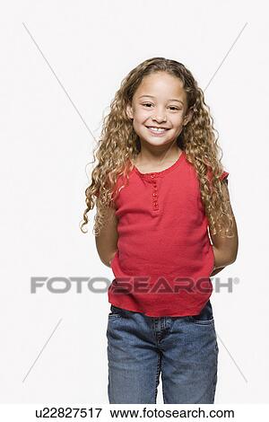 Portrait of smiling girl (8-9), studio shot View Large Photo Image Stock Photo - Portrait of smiling girl (8-9), studio shot. Fotosearch