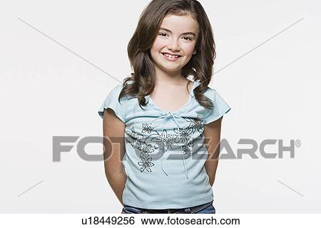 Portrait of smiling girl (8-9), studio shot View Large Photo Image Stock Photograph - Portrait of smiling girl (8-9), studio shot. Fotosearch