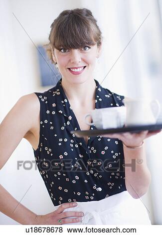 Portrait of smiling waitress View Large Photo Image Stock Photo - Portrait of smiling waitress. Fotosearch