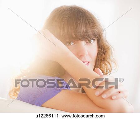 Portrait of smiling woman in backlit View Large Photo Image Stock Image - Portrait of smiling woman in backlit. Fotosearch