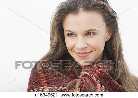 Stock Image - Portrait of smiling woman. Fotosearch