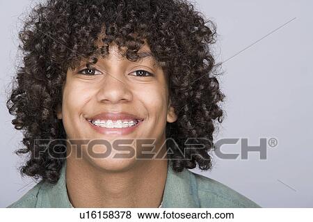 Portrait of teenage boy (14-15) View Large Photo Image Stock Photo - Portrait of teenage boy (14-15). Fotosearch