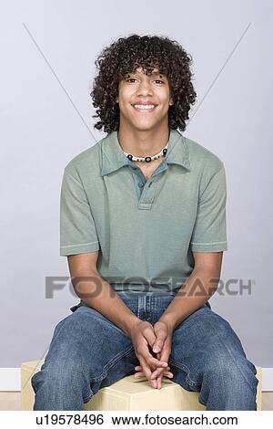 Portrait of teenage boy (14-15) View Large Photo Image Stock Photograph - Portrait of teenage boy (14-15). Fotosearch