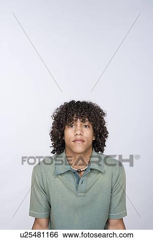 Portrait of teenage boy (14-15) View Large Photo Image Stock Photograph - Portrait of teenage boy (14-15). Fotosearch