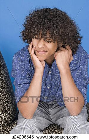 Portrait of teenage boy (14-15) View Large Photo Image Stock Photography - Portrait of teenage boy (14-15). Fotosearch