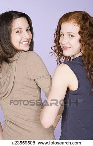 Stock Photo - Portrait of teenage boy girls (16-17). Fotosearch