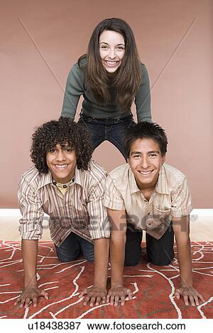 Portrait of teenage boys and girl (14-15, 16-17) View Large Photo Image Stock Photo - Portrait of teenage boys and girl (14-15, 16-17). Fotosearch