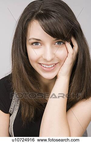 Stock Photograph - Portrait of teenage girl (16-17). Fotosearch
