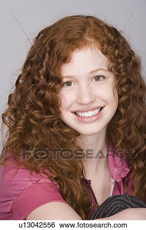 Stock Photograph - Portrait of teenage girl (16-17). Fotosearch