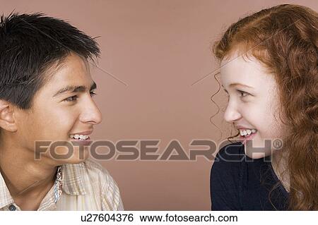Portrait of teenage girl and boy (16-17) View Large Photo Image Stock Photograph - Portrait of teenage girl and boy (16-17). Fotosearch