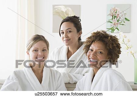 Portrait of three attractive women relaxing in spa View Large Photo Image Stock Photo - Portrait of three attractive women relaxing in spa. Fotosearch