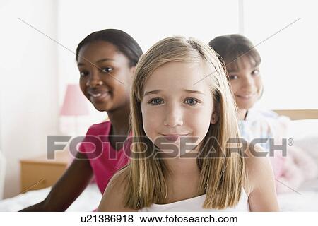 Portrait of three girls (10-11) View Large Photo Image Stock Photo - Portrait of three girls (10-11) . Fotosearch