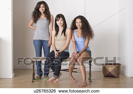Portrait of three young women View Large Photo Image Stock Photograph - Portrait of three young women. Fotosearch