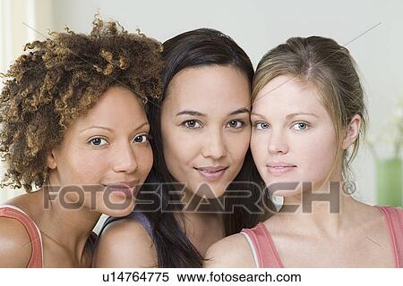 Stock Photography - Portrait of tree attractive women. Fotosearch