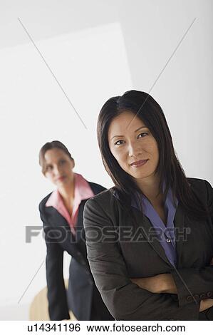Portrait of two businesswomen View Large Photo Image Stock Photograph - Portrait of two businesswomen. Fotosearch
