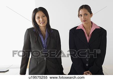 Portrait of two businesswomen View Large Photo Image Stock Photography - Portrait of two businesswomen. Fotosearch