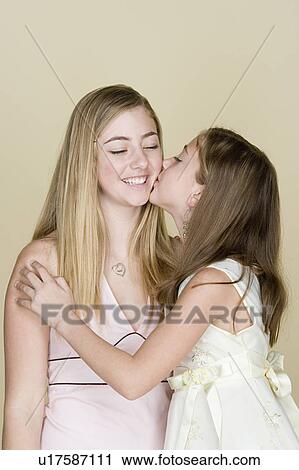 Portrait of two sisters (14-15, 8-9) View Large Photo Image Stock Image - Portrait of two sisters (14-15, 8-9). Fotosearch