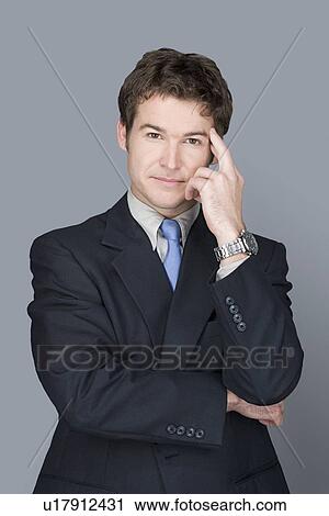 Portrait of young businessman View Large Photo Image Stock Image - Portrait of young businessman. Fotosearch