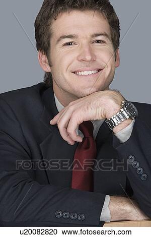 Portrait of young businessman View Large Photo Image Stock Image - Portrait of young businessman. Fotosearch