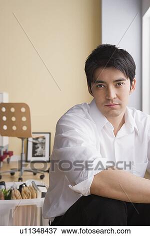 Portrait of young businessman View Large Photo Image Stock Photo - Portrait of young businessman. Fotosearch