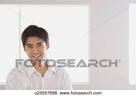 Portrait of young businessman View Large Photo Image Stock Photo - Portrait of young businessman. Fotosearch