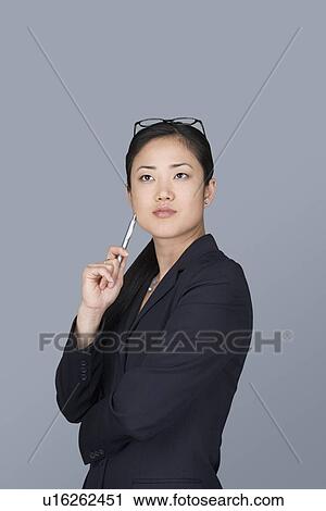 Stock Image - Portrait of young businesswoman. Fotosearch