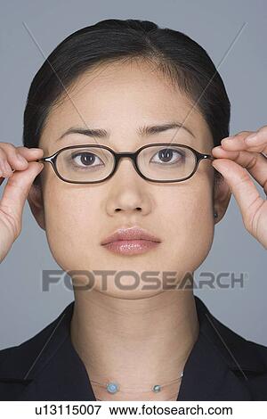 Stock Photo - Portrait of young businesswoman. Fotosearch