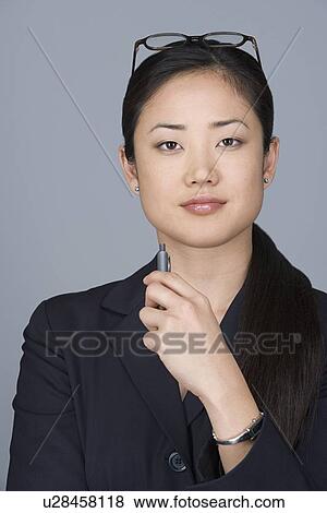 Portrait of young businesswoman View Large Photo Image Stock Photo - Portrait of young businesswoman. Fotosearch