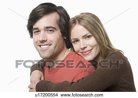Portrait of young couple enjoying together View Large Photo Image Picture - Portrait of young couple enjoying together. Fotosearch
