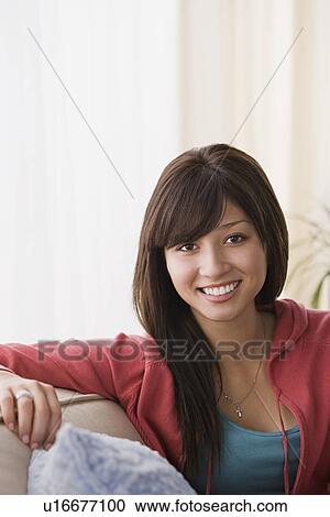 Stock Image - Portrait of young woman. Fotosearch