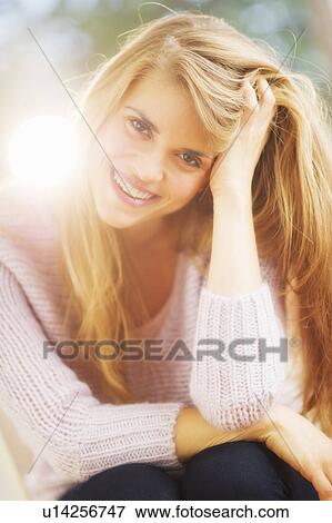 Portrait of young woman View Large Photo Image Stock Photo - Portrait of young woman. Fotosearch