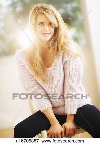 Stock Photo - Portrait of young woman. Fotosearch