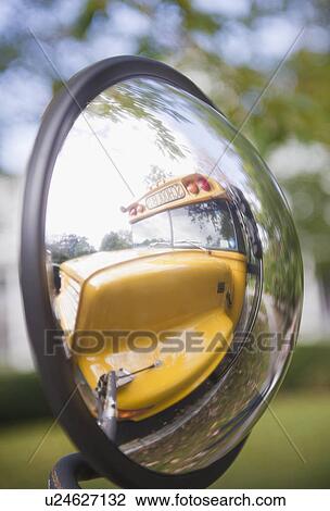 Reflection of school bus in rear view mirror View Large Photo Image Stock Image - Reflection of school bus in rear view mirror. Fotosearch