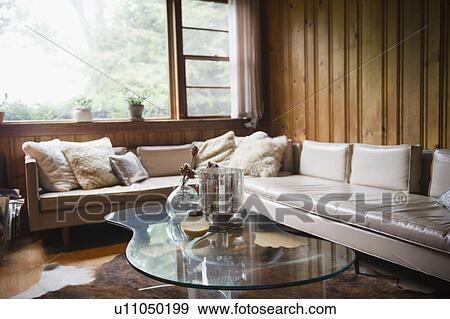 Stock Photo - Roaring Brook Lake, Living room in summer home. Fotosearch
