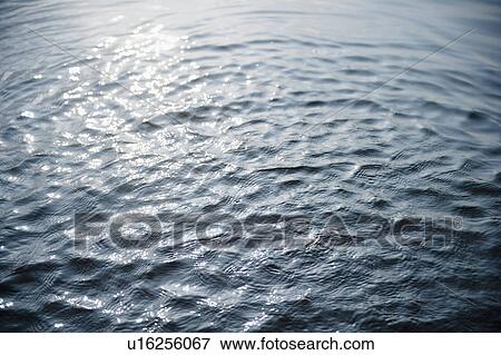 Stock Photo - Roaring Brook Lake, Rippled water surface. Fotosearch