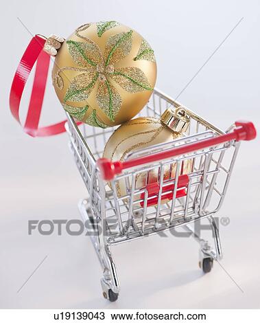 Shopping cart with christmas decorations View Large Photo Image Stock Image - Shopping cart with christmas decorations. Fotosearch