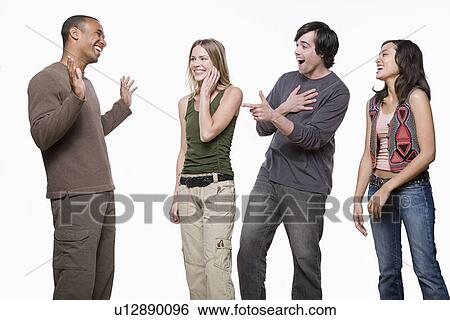 Studio portrait of group of young people View Large Photo Image Stock Photograph - Studio portrait of group of young people. Fotosearch