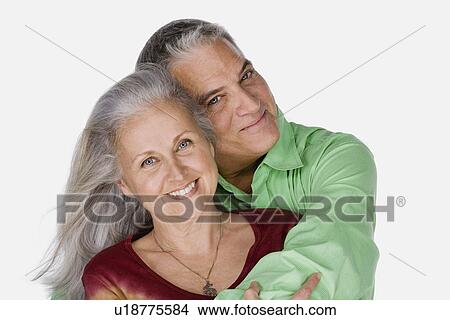 Studio portrait of mature couple View Large Photo Image Picture - Studio portrait of mature couple. Fotosearch