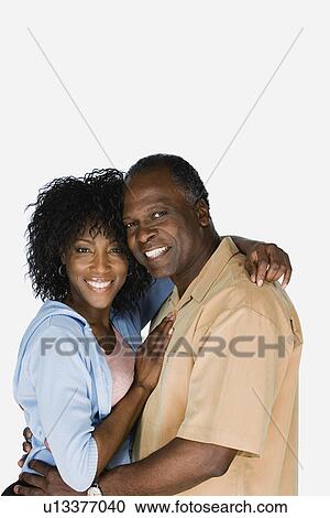 Studio portrait of mature couple View Large Photo Image Stock Image - Studio portrait of mature couple. Fotosearch