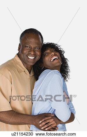 Studio portrait of mature couple View Large Photo Image Stock Image - Studio portrait of mature couple. Fotosearch