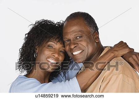 Studio portrait of mature couple View Large Photo Image Stock Photo - Studio portrait of mature couple. Fotosearch