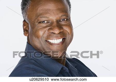 Studio portrait of mature man View Large Photo Image Stock Image - Studio portrait of mature man. Fotosearch