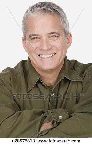Stock Photo - Studio portrait of mature man. Fotosearch
