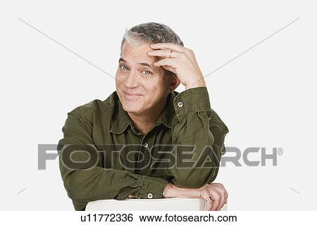 Studio portrait of mature man View Large Photo Image Stock Photograph - Studio portrait of mature man. Fotosearch