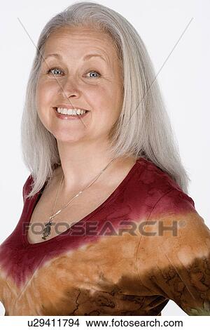 Studio portrait of mature woman View Large Photo Image Picture - Studio portrait of mature woman. Fotosearch