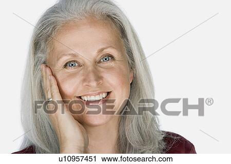 Studio portrait of mature woman View Large Photo Image Stock Image - Studio portrait of mature woman. Fotosearch
