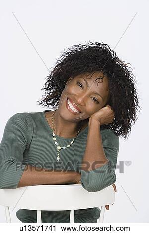 Studio portrait of mature woman View Large Photo Image Stock Image - Studio portrait of mature woman. Fotosearch