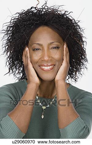 Studio portrait of mature woman View Large Photo Image Stock Image - Studio portrait of mature woman. Fotosearch