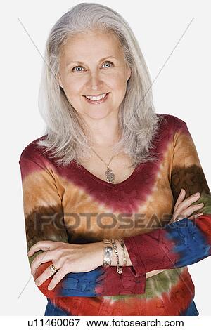 Studio portrait of mature woman View Large Photo Image Stock Photo - Studio portrait of mature woman. Fotosearch